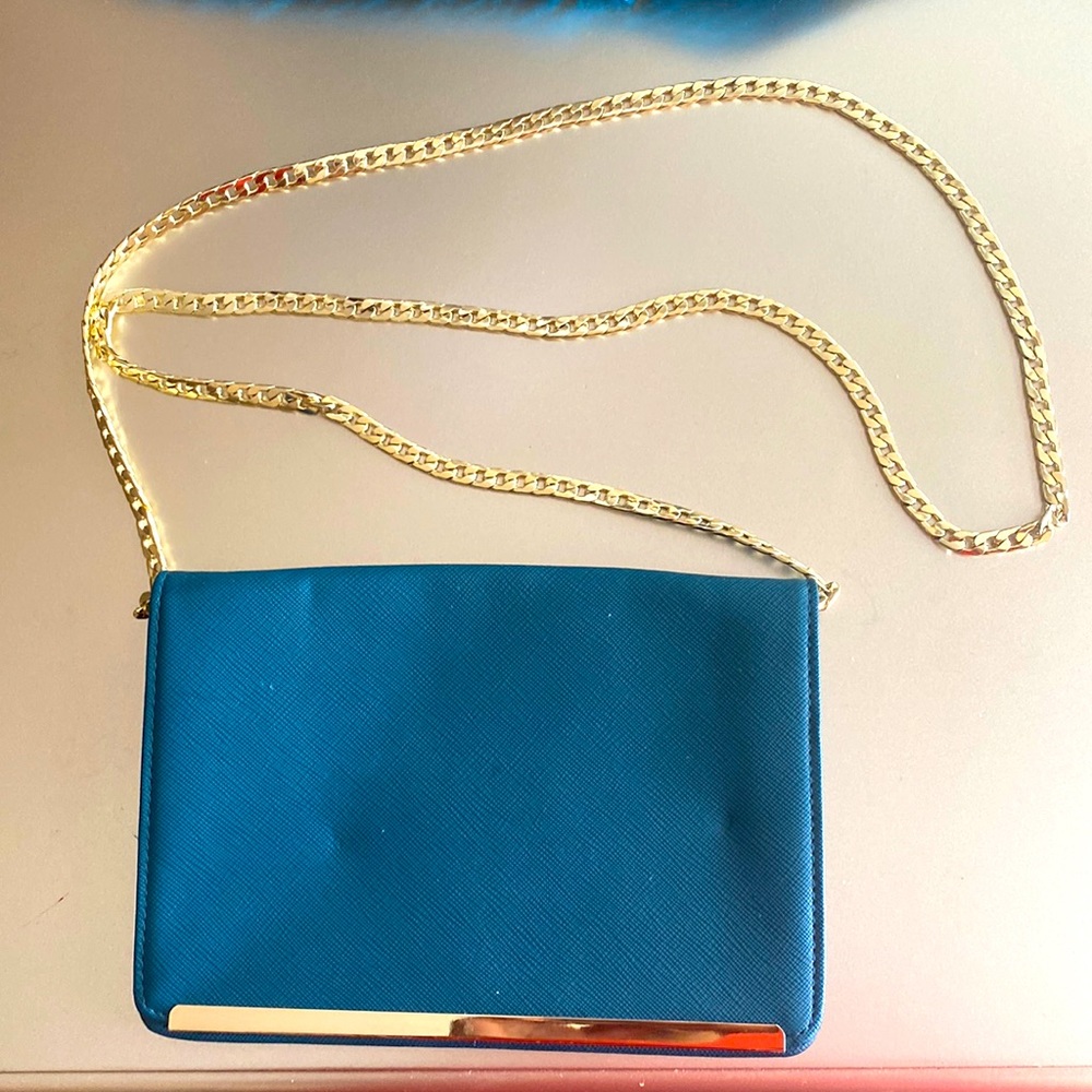 Small teal crossbody bag with gold strap